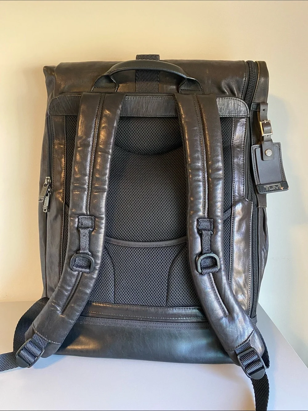 Tumi Black Leather Roll-Top Backpack with Front Pockets